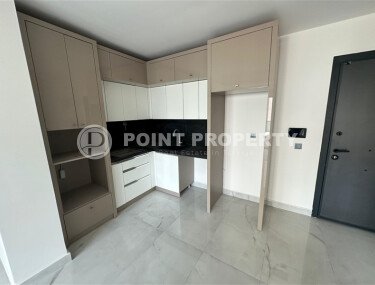 Современная квартира 1+1 в дизайнерском комплексе 2024 года в Махмутларе-id-9860-фото-4