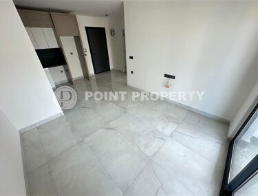 Современная квартира 1+1 в дизайнерском комплексе 2024 года в Махмутларе-id-9860-фото-5