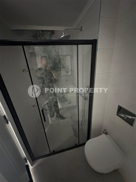 Современная квартира 1+1 в дизайнерском комплексе 2024 года в Махмутларе-id-9860-фото-9