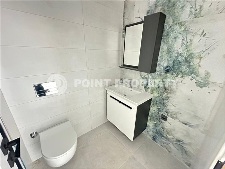 Современная квартира 1+1 в дизайнерском комплексе 2024 года в Махмутларе-id-9860-фото-10