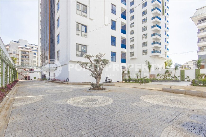 Современная квартира 1+1 в дизайнерском комплексе 2024 года в Махмутларе-id-9860-фото-11