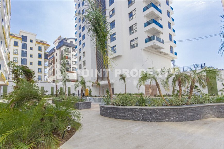 Современная квартира 1+1 в дизайнерском комплексе 2024 года в Махмутларе-id-9860-фото-12