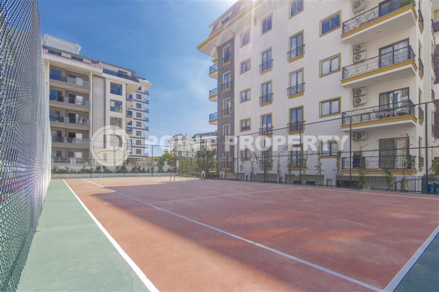 Современная квартира 1+1 в дизайнерском комплексе 2024 года в Махмутларе-id-9860-фото-15