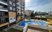 Квартира 2+1 площадью 75 м² в новом жилом комплексе в центре Махмутлара-id-9863-фото-1