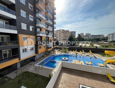 Квартира 2+1 площадью 75 м² в новом жилом комплексе в центре Махмутлара-id-9863-фото-2