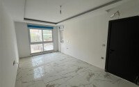 Квартира 2+1 площадью 75 м² в новом жилом комплексе в центре Махмутлара-id-9863-фото-2