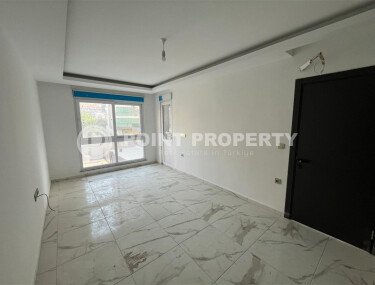 Квартира 2+1 площадью 75 м² в новом жилом комплексе в центре Махмутлара-id-9863-фото-2