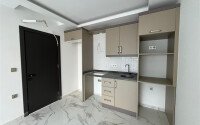 Квартира 2+1 площадью 75 м² в новом жилом комплексе в центре Махмутлара-id-9863-фото-3