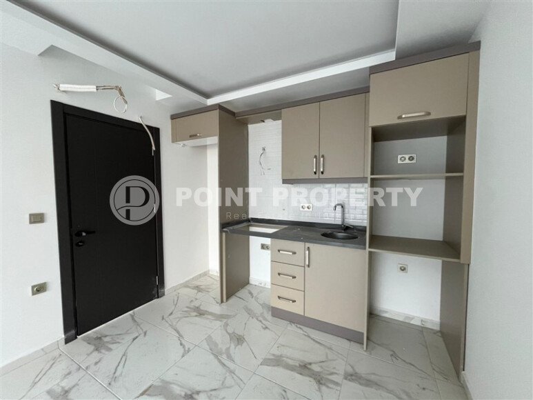 Квартира 2+1 площадью 75 м² в новом жилом комплексе в центре Махмутлара-id-9863-фото-3