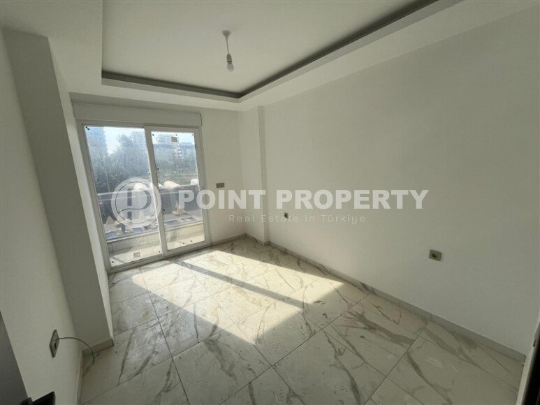 Квартира 2+1 площадью 75 м² в новом жилом комплексе в центре Махмутлара-id-9863-фото-4