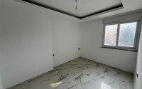 Квартира 2+1 площадью 75 м² в новом жилом комплексе в центре Махмутлара-id-9863-фото-5