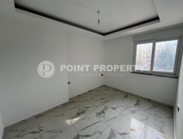 2+1 apartment with an area of 75 m² in a new residential complex in the center of Mahmutlar-id-9863-photo-5