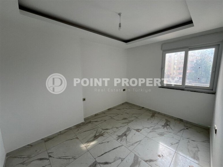 2+1 apartment with an area of 75 m² in a new residential complex in the center of Mahmutlar-id-9863-photo-5