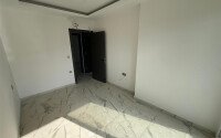 2+1 apartment with an area of 75 m² in a new residential complex in the center of Mahmutlar-id-9863-photo-6