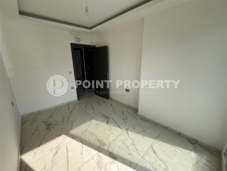 2+1 apartment with an area of 75 m² in a new residential complex in the center of Mahmutlar-id-9863-photo-6