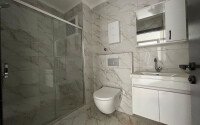 Квартира 2+1 площадью 75 м² в новом жилом комплексе в центре Махмутлара-id-9863-фото-7