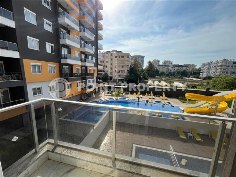 2+1 apartment with an area of 75 m² in a new residential complex in the center of Mahmutlar-id-9863-photo-8