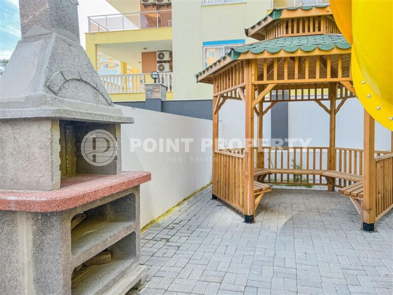 2+1 apartment with an area of 75 m² in a new residential complex in the center of Mahmutlar-id-9863-photo-9