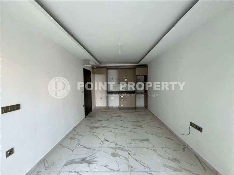 2+1 apartment with an area of 75 m² in a new residential complex in the center of Mahmutlar-id-9863-photo-11