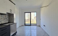 Современная квартира 1+1 рядом с морем, 50 м², район Кестель-id-9864-фото-2