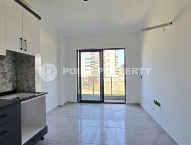 Современная квартира 1+1 рядом с морем, 50 м², район Кестель-id-9864-фото-2
