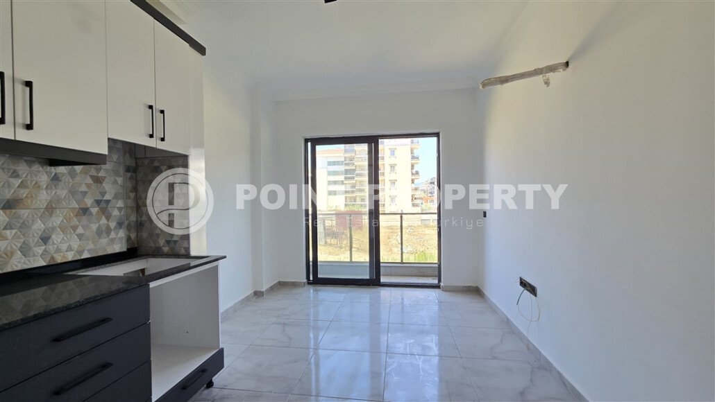 Современная квартира 1+1 рядом с морем, 50 м², район Кестель-id-9864-фото-2