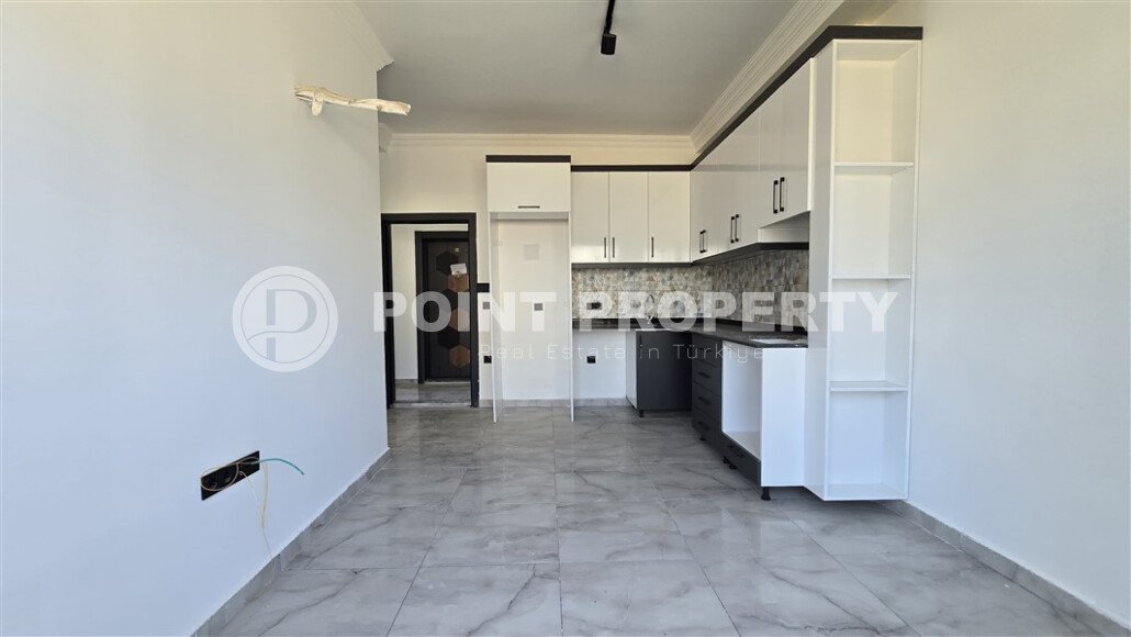 Современная квартира 1+1 рядом с морем, 50 м², район Кестель-id-9864-фото-3