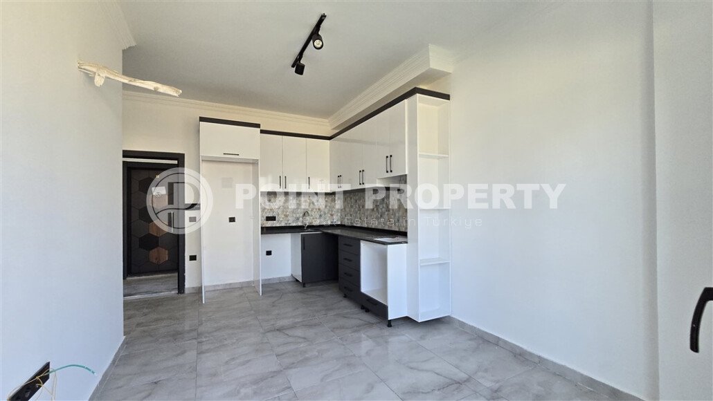 Современная квартира 1+1 рядом с морем, 50 м², район Кестель-id-9864-фото-6