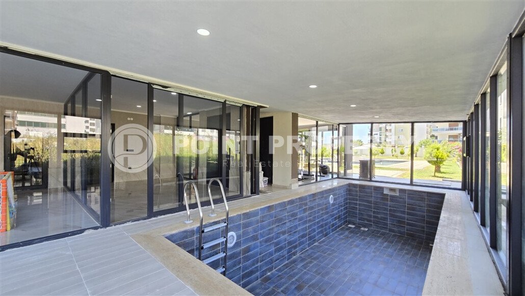 Современная квартира 1+1 рядом с морем, 50 м², район Кестель-id-9864-фото-13