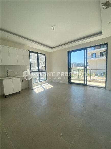 Современная квартира 1+1 с ремонтом в престижном районе Каргыджак, 400 м до моря-id-9872-фото-2