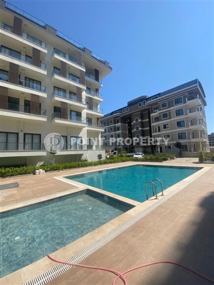 Современная квартира 1+1 с ремонтом в престижном районе Каргыджак, 400 м до моря-id-9872-фото-10