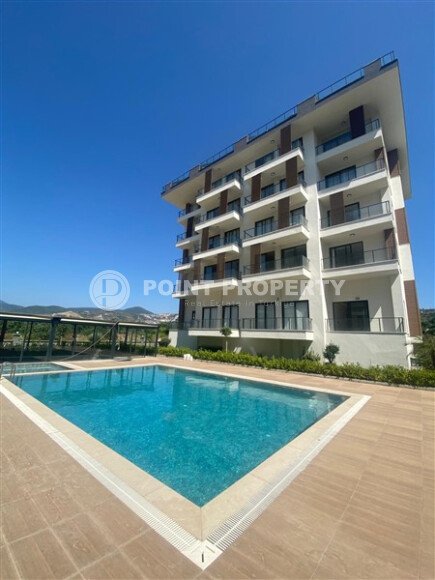 Современная квартира 1+1 с ремонтом в престижном районе Каргыджак, 400 м до моря-id-9872-фото-11