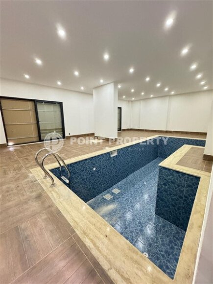 Светлый дуплекс 100 м² с видом на море в новом комплексе района Махмутлар-id-9873-фото-13