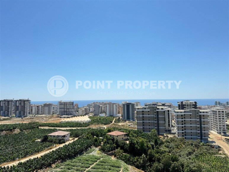 Светлый дуплекс 100 м² с видом на море в новом комплексе района Махмутлар-id-9873-фото-15