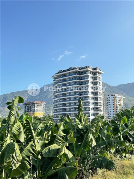 Светлый дуплекс 100 м² с видом на море в новом комплексе района Махмутлар-id-9873-фото-16