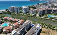 Garden duplex 110 m² in the Kestel area, just 250 m from the sea-id-9874-photo-17