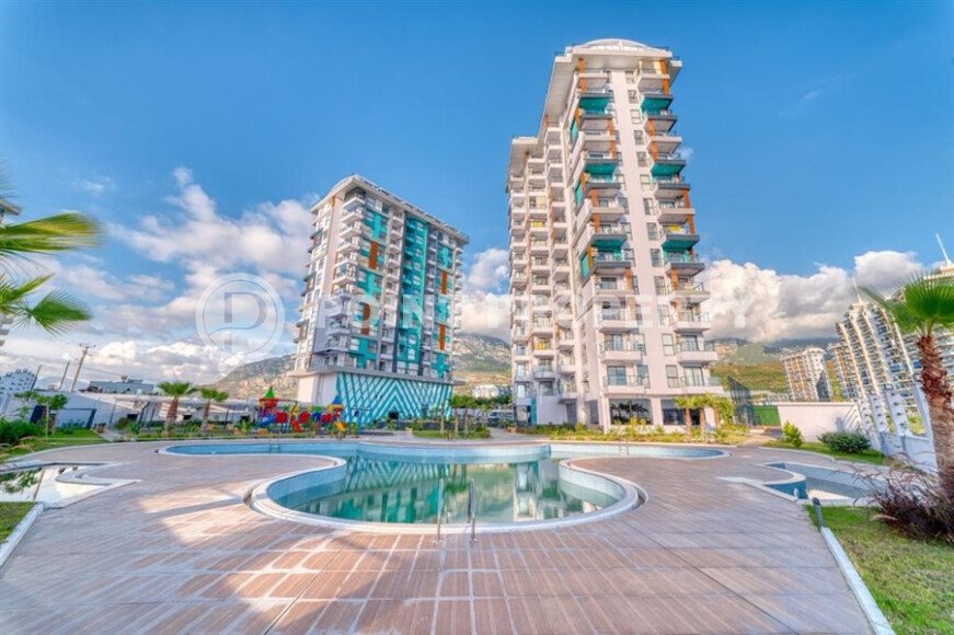 Bright apartment 58 m² in Mahmutlar with sea and mountain views-id-9880-photo-1