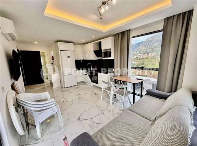 Светлая квартира 58 м² в Махмутларе с видом на море и горы-id-9880-фото-3