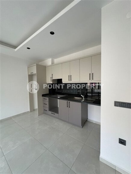 Новая квартира 50 м² в Махмутларе в комплексе с богатой инфраструктурой-id-9893-фото-2