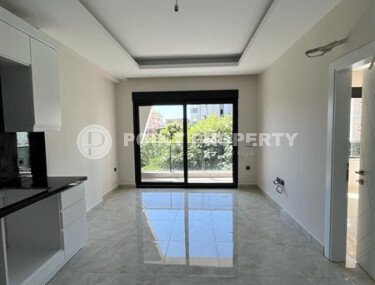 Современная квартира 50 м² в комплексе с инфраструктурой в Махмутларе-id-9897-фото-2