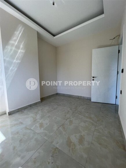 Современная квартира 50 м² в комплексе с инфраструктурой в Махмутларе-id-9897-фото-6