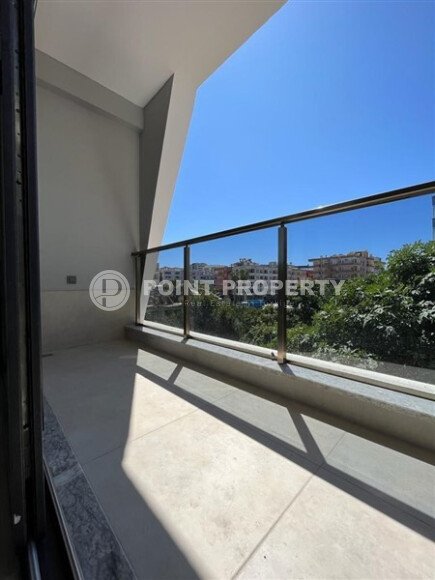 Современная квартира 50 м² в комплексе с инфраструктурой в Махмутларе-id-9897-фото-10