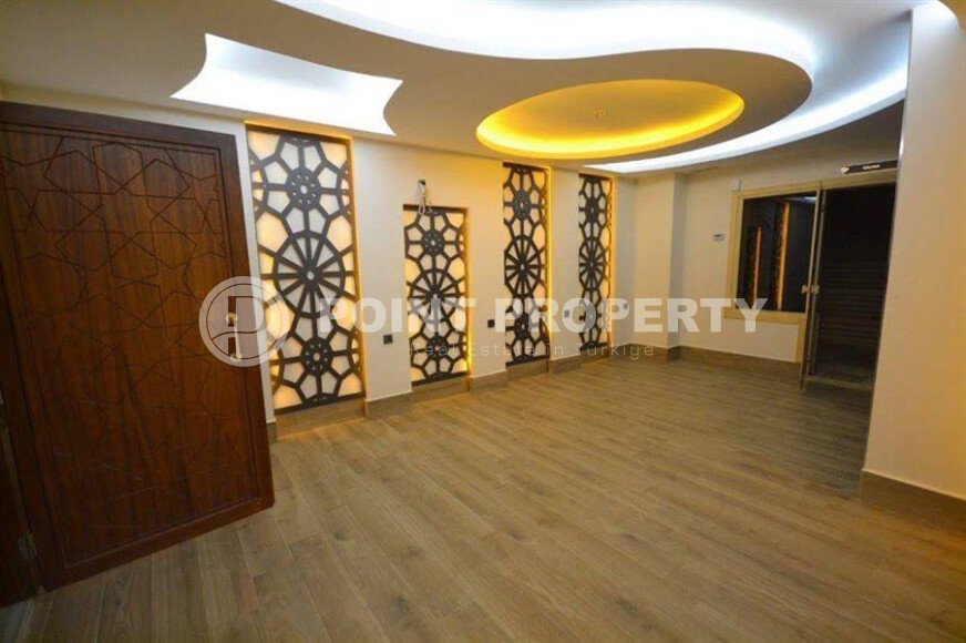 Современная квартира 50 м² в комплексе с инфраструктурой в Махмутларе-id-9897-фото-11