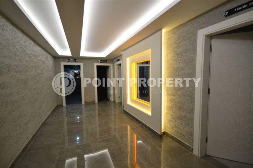 Современная квартира 50 м² в комплексе с инфраструктурой в Махмутларе-id-9897-фото-12