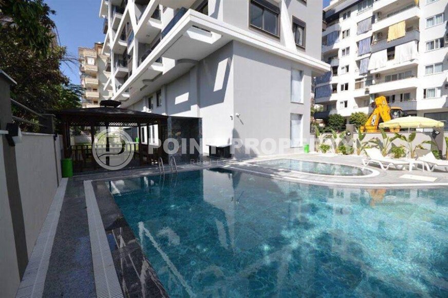 Современная квартира 50 м² в комплексе с инфраструктурой в Махмутларе-id-9897-фото-13