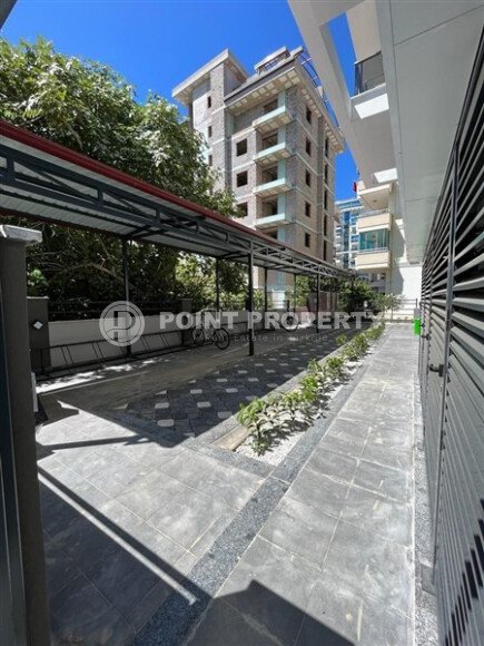 Современная квартира 50 м² в комплексе с инфраструктурой в Махмутларе-id-9897-фото-18