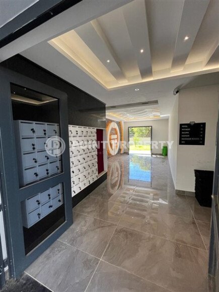 Современная квартира 50 м² в комплексе с инфраструктурой в Махмутларе-id-9897-фото-19