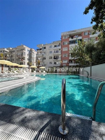 Современная квартира 50 м² в комплексе с инфраструктурой в Махмутларе-id-9897-фото-24