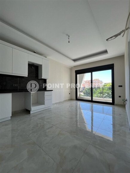 Современная квартира 50 м² в комплексе с инфраструктурой в Махмутларе-id-9897-фото-25