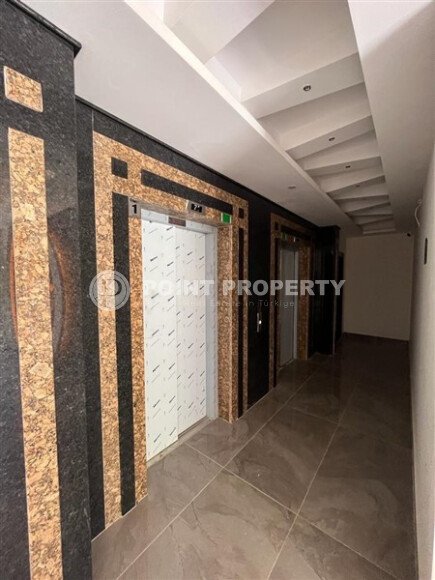 Современная квартира 50 м² в комплексе с инфраструктурой в Махмутларе-id-9897-фото-26